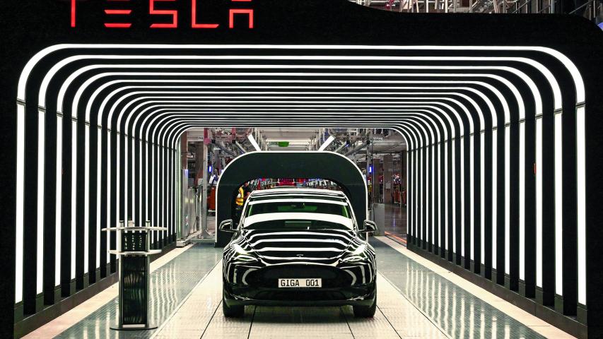 FILE PHOTO: Model Y cars are pictured during the opening ceremony of the new Tesla Gigafactory for electric cars in Gruenheide, Germany, March 22, 2022. Patrick Pleul/Pool via REUTERS/File Photo