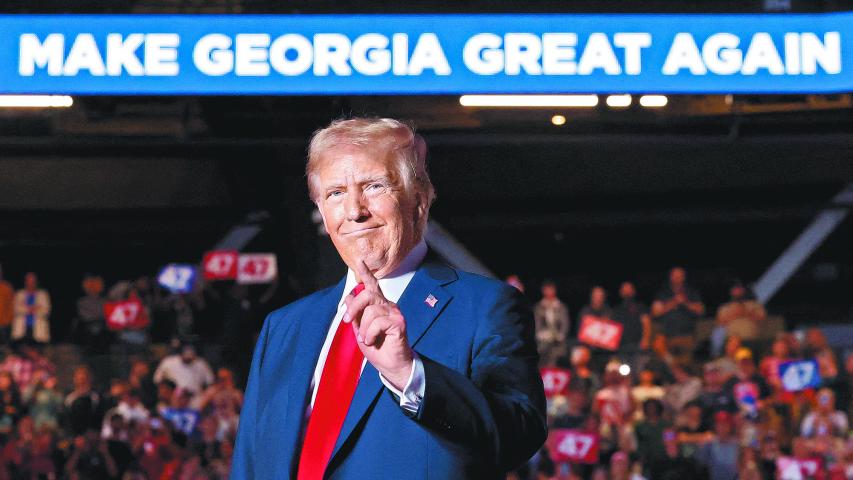 Republican presidential nominee former U.S. President Donald Trump attends a campaign rally at McCamish Pavilion, in Atlanta, Georgia, U.S., October 28, 2024. REUTERS/Brendan McDermid