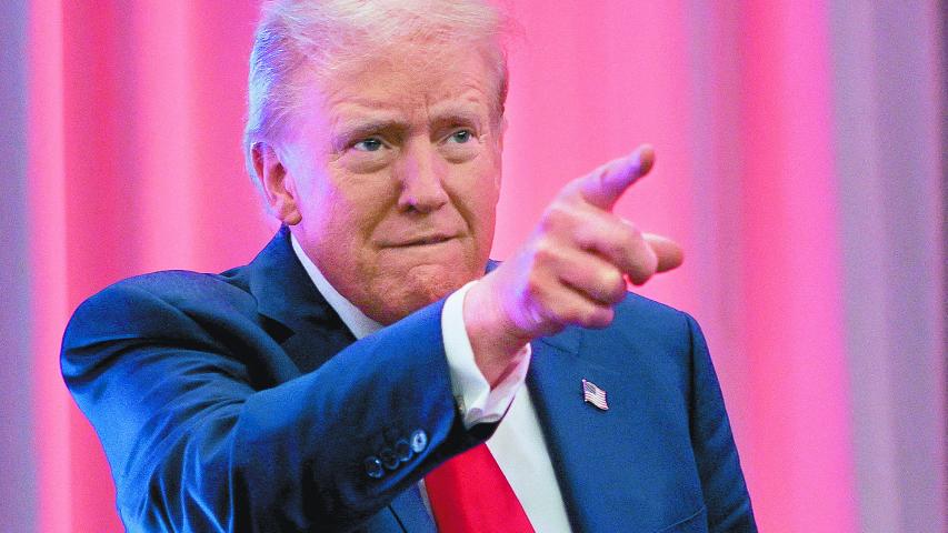 FILE PHOTO: U.S. President-elect Donald Trump gestures as he meets with House Republicans on Capitol Hill in Washington, U.S., November 13, 2024. REUTERS/Brian Snyder/File Photo