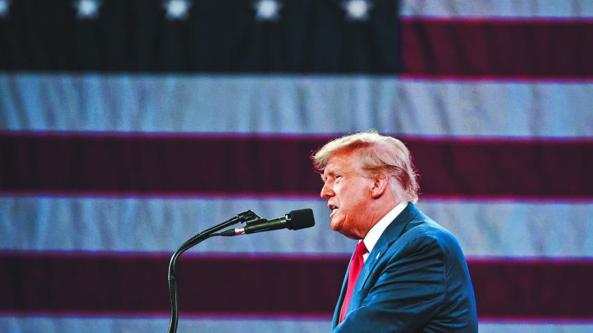 NATIONAL HARBOR, MD, USA- February 24, 2024: Donald Trump speaks at an event about his plan for defeating current President Joe Biden in November.