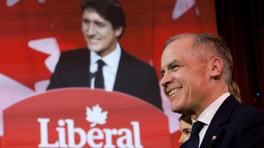 El futuro primer ministro de Canadá, Mark Carney, y en el fondo Justin Trudeau.