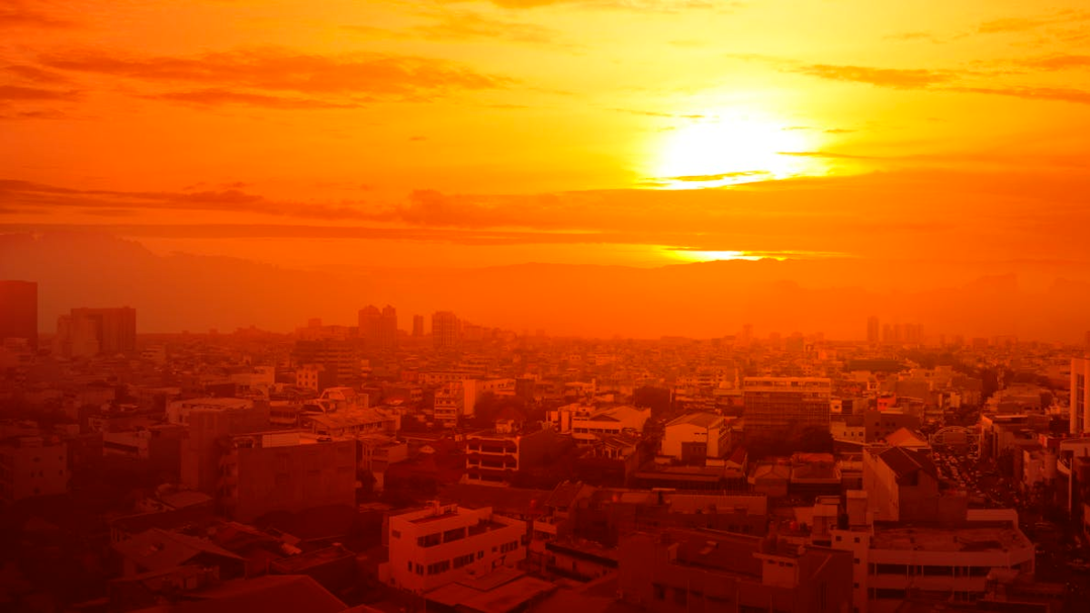 Woman smiling at phone screen