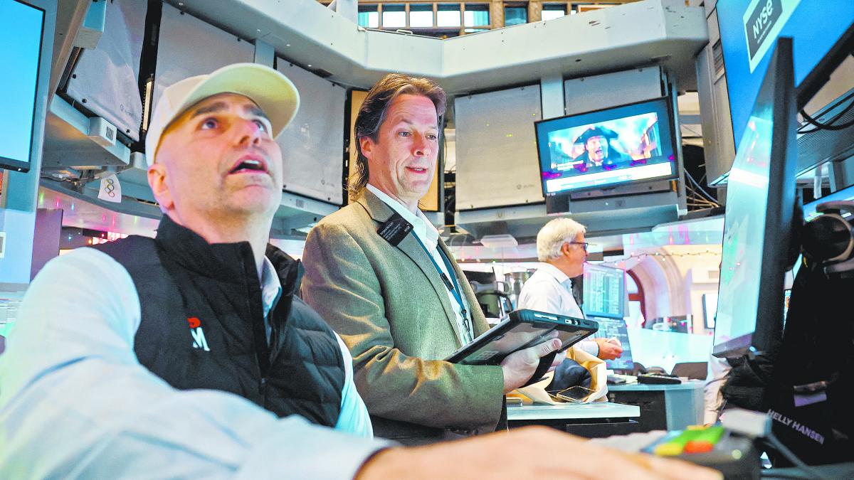 Wall Street sube tras recorte de tasas de la Reserva Federal