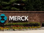 FILE PHOTO: The Merck logo is seen at a gate to the Merck & Co campus in Rahway, New Jersey, U.S., July 12, 2018. REUTERS/Brendan McDermid/File Photo