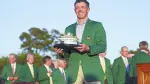 AUGUSTA, GEORGIA - APRIL 12: Rory McIlroy of Northern Ireland poses with the Masters Trophy during the Green Jacket Ceremony after winning the final round of the 2026 Masters Tournament at Augusta National Golf Club on April 12, 2026 in Augusta, Georgia.   Hector Vivas/Getty Images/AFP (Photo by Hector Vivas / GETTY IMAGES NORTH AMERICA / Getty Images via AFP)