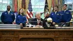 US President Donald Trump speaks as he welcomes the Artemis II astronauts, from L to R, Victor Glover, Christina Koch, Reid Wiseman and Jeremy Hansen in the Oval Office at the White House in Washington, DC, on April 29, 2026. (Photo by Brendan SMIALOWSKI / AFP)