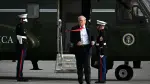 US President Donald Trump steps off Marine One after landing at Ocala International Airport, in Ocala, Florida on May 1, 2026, after giving a speech about taxes and Social Security at The Villages. (Photo by Jim WATSON / AFP)