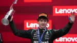 Formula One F1 - Canadian Grand Prix -  Circuit Gilles Villeneuve, Montreal, Quebec, Canada - May 24, 2026 Mercedes' Andrea Kimi Antonelli celebrates on the podium with a trophy after winning the Canadian Grand Prix REUTERS/Mathieu Belanger
