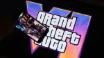 This illustration photo created in Los Angeles, December 4, 2023, shows Rockstar Games Grand Theft Auto VI trailer played on a screen in front of the game title. The first trailer for "Grand Theft Auto VI" was officially released ahead of schedule December 4, 2023 due to a leak, touting a 2025 release for the next chapter of the massively successful video game franchise. (Photo by Chris DELMAS / AFP)