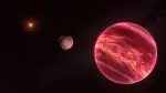 Una representación artística muestra el sistema en torno a la estrella CD-35 2722, con el objeto recién descubierto —similar a una luna— situado en el centro. La estrella —el punto luminoso a la izquierda— tiene aproximadamente la mitad de la masa de nuestro Sol y es orbitada por una enana marrón, el objeto de color marrón rojizo que se aprecia aquí en primer plano (a la derecha). Foto: Reuters