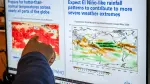 Head of climate prediction services at the World Meteorological Organization (WMO) Wilfran Moufouma-Okia points on graphs displayed on a computer screen at the WMO headquarters in Geneva, on June 1, 2026. There is an 80-percent chance of the warming El Nino phenomenon developing between June and August, increasing the risk of extreme weather events, the World Meteorological Organization said on June 2, 2026. (Photo by Fabrice COFFRINI / AFP)