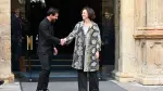 Leo Messi y la directora de la Fundación Princesa de Asturias, Teresa Sanjurjo, a las puertas del la Reconquista en Oviedo, España.