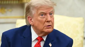 US President Donald Trump listens to questions from the press as he meets with Lebanese President Joseph Aoun in the Oval Office of the White House in Washington, DC, on July 21, 2026. (Photo by SAUL LOEB / AFP)