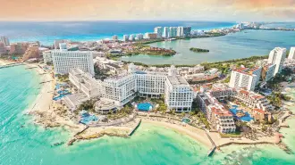 View of beautiful Hotels in the hotel zone of Cancun at sunset. Riviera Maya region in Quintana roo on Yucatan Peninsula