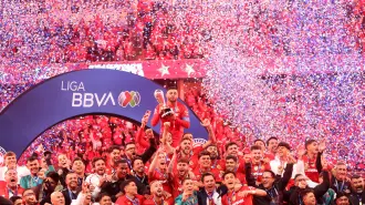 Soccer Football - Liga MX - Final - Second Leg - Toluca v Tigres UANL - Estadio Nemesio Diez, Toluca, Mexico - December 14, 2025 Toluca's Alexis Vega and teammates celebrate with the trophy after winning Liga MX REUTERS/Henry Romero