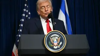 US President Donald Trump speaks during a joint press conference with Israeli Prime Minister Benjamin Netanyahu (off frame) at Trumps Mar-a-Lago residence in Palm Beach, Florida, on December 29, 2025. US President Donald Trump hosted Israeli Prime Minister Benjamin Netanyahu in Florida on December 29 for crucial talks on moving to the next stage of the fragile Gaza truce plan.The two leaders also discussed Iran, with Trump saying that if Tehran rebuilt its nuclear facilities the United States would "knock them down." (Photo by Jim WATSON / AFP)