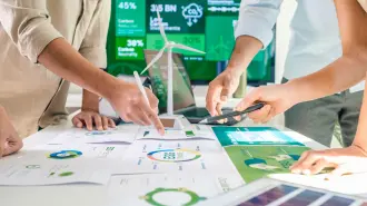 diversity team discussion focused on ESG (environment,social,governance)  for net zero goals in a sustainable green office