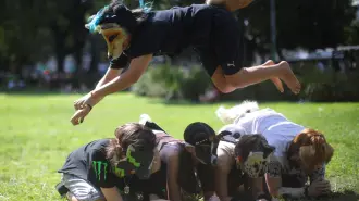 A person jumps over others while walking on all fours during a gathering of teenagers who identify as "Therians," a subculture whose members adopt animal characteristics, in Buenos Aires, Argentina, February 22, 2026. REUTERS/Tomas Cuesta