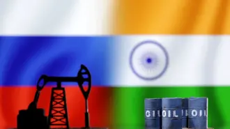 FILE PHOTO: A model of an oil pump jack and oil barrels are seen in front of Russian and Indian flags in this illustration taken, December 9, 2022. REUTERS/Dado Ruvic/Illustration/File Photo
