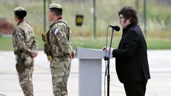 Argentina's President Javier Milei speaks during an official ceremony to present six new F-16 Fighting Falcon jets at the Area de Material Rio IV" in Rio Cuarto, Cordoba province, Argentina on December 6, 2025. (Photo by Nicolas AGUILERA / AFP)