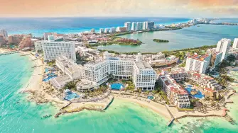 View of beautiful Hotels in the hotel zone of Cancun at sunset. Riviera Maya region in Quintana roo on Yucatan Peninsula