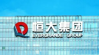 FILE PHOTO: The company logo is seen on the headquarters of China Evergrande Group in Shenzhen