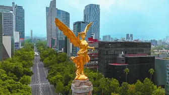 Mexico City, Mex. June 29, 2024: Iconic Angel of Independence, the monument stands in the middle of Reforma Avenue in front of an empty city after a peaceful march that left the city uninhabited.