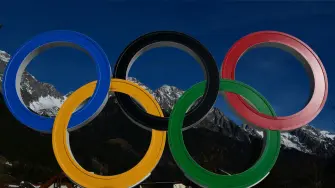 A picture shows the Olympic rings in Anterselva which will host the biathlon competition ahead of Milano Cortina 2026 Games, on December 12, 2025. (Photo by Stefano RELLANDINI / AFP)