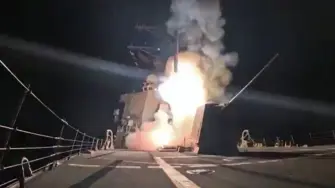This screen grab from a video posted by the US Department of Defense on their X account on December 25, 2025, shows a missile launch from a naval vessel as President Donald Trump says US forces conducted "powerful and deadly" strikes against Islamic State militants in northwestern Nigeria on December 25, 2025, weeks after he warned against any systemic assault on Christians in the country. The United States on Friday confirmed that its strikes against jihadist groups in northern Nigeria were launched with the west African country's approval. (Photo by HANDOUT / US Department of Defense / AFP) / RESTRICTED TO EDITORIAL USE - MANDATORY CREDIT "AFP PHOTO /  US DEPARTMENT OF DEFENSE / HANDOUT" - HANDOUT - NO MARKETING NO ADVERTISING CAMPAIGNS - DISTRIBUTED AS A SERVICE TO CLIENTS