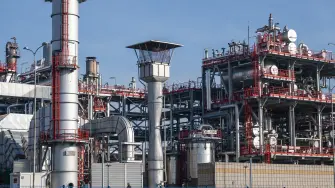 This photograph shows the Petroleum Industry of Serbia (NIS), Serbias only oil refinery, which has halted production and is in the process of shutting down due to US sanctions in Pancevo on December 10, 2025. The refinery  that previously supplied around 80 percent of Serbias fuel needs  has been unable to receive crude oil since October 9, 2025 after its Russian majority owners were hit by US sanctions over Moscows invasion of Ukraine. (Photo by Andrej ISAKOVIC / AFP)