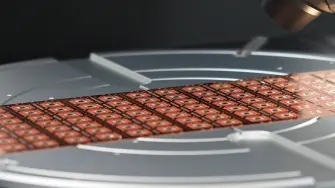 This photograph taken on September 10, 2025 shows an engineer inspecting semiconductor chips to detect counterfeits at the OSAT (outsourced semiconductor assembly and testing) facility of chipmaker CG Semi, a joint subsidiary of CG Power and Industrial Solutions in Sanand, in India's Gujarat state. Chips are viewed as key to growth and a source of geopolitical clout. India says it wants to build a "complete ecosystem", and break the global supply chain dominance by a few regions. CG Semi plans to invest nearly $900 million in two assembly and test plants, as well as to push its design company. (Photo by Sam PANTHAKY / AFP) / TO GO WITH 'INDIA-ECONOMY-POLITICS-SEMICONDUCTORS' INTERVIEW