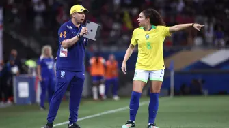 A member of the coaching staff for Brazils womens football team gives instructions to Brazil's midfielder #08 Angelina during the women's friendly football match between France and Brazil at the Stade des Alpes in Grenoble, central-eastern France, on June 27, 2025. (Photo by Alex MARTIN / AFP) / The erroneous mention[s] appearing in the metadata of this photo by Alex MARTIN has been modified in AFP systems in the following manner: [A member of the coaching staff for Brazils womens football team] instead of [Brazil's women football head coach Arthur Elias]. Please immediately remove the erroneous mention[s] from all your online services and delete it (them) from your servers. If you have been authorized by AFP to distribute it (them) to third parties, please ensure that the same actions are carried out by them. Failure to promptly comply with these instructions will entail liability on your part for any continued or post notification usage. Therefore we thank you very much for all your attention and prompt action. We are sorry for the inconvenience this notification may cause and remain at your disposal for any further information you may require.