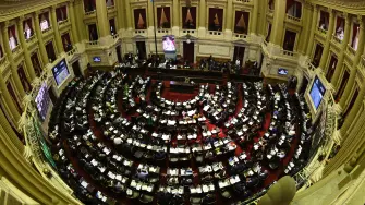 Aerial view of the Argentine Chamber of Deputies during a session in which a bill for legalization of abortion was started to be debated in Buenos Aires on december 10, 2020. The Argentine Chamber of Deputies stated debating Thursday a bill for the legalization of abortion, after a similar initiative failed two years ago, in a session that will be extended until Friday. (Photo by JUAN MABROMATA / AFP)