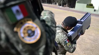 Members of the Mexican Army's special anti-drone battalion, tasked with protecting venues and ensuring security for the 2026 World Cup, give a demonstration for the press at Military Camp Number 1 in the municipality of Naucalpan, State of Mexico, on February 17, 2026. (Photo by Alfredo ESTRELLA / AFP)