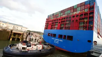 Chinese Cosco Shipping Rose container ship sails the newly inaugurated Cocoli locks, during the visit of China's President Xi Jinping, in the Panama Canal, on December 3, 2018. Chinese President Xi Jinping is on an official visit to Panama after attending the G20 Summit in Argentina. (Photo by Luis Acosta / AFP)
