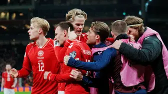 Soccer Football - FIFA World Cup - UEFA Qualifiers - Semi Final - Denmark v North Macedonia - Parken, Copenhagen, Denmark - March 26, 2026 Denmark's Mikkel Damsgaard celebrates scoring their first goal with teammates Liselotte Sabroe/Ritzau Scanpix via REUTERS     ATTENTION EDITORS - THIS IMAGE WAS PROVIDED BY A THIRD PARTY. DENMARK OUT. NO COMMERCIAL OR EDITORIAL SALES IN DENMARK.