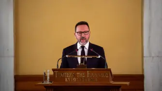 Bank of Greece governor Yannis Stournaras speaks during a meeting of the bank's shareholders in Athens on April 1, 2019. (Photo by ANGELOS TZORTZINIS / AFP)