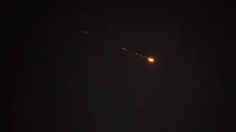 A rocket trail is seen in the sky above the Israeli coastal city of Netanya amid a fresh barrage of Iranian missiles on March 30, 2026. The Middle East was sparked by joint US-Israeli strikes on Iran that triggered a wave of retaliatory missile and drone attacks against Israel and several other countries in the region. (Photo by JACK GUEZ / AFP) /