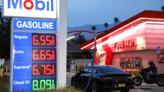 PASADENA, CALIFORNIA - MARCH 30: Gas prices are displayed at a Mobil gas station on March 30, 2026 in Pasadena, California. The average price of one gallon of regular self-service gasoline rose to $5.99 today in Los Angeles County, climbing from $4.69 one month ago, amid the ongoing war with Iran.   Mario Tama/Getty Images/AFP (Photo by MARIO TAMA / GETTY IMAGES NORTH AMERICA / Getty Images via AFP)