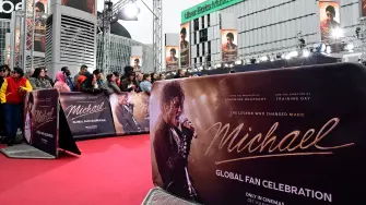 Fans wait for guests to arrive on the red carptet for the world premiere of the Michael Jackson biopic "Michael" at the Uber Eats Music Hall in Berlin on April 10, 2026. Thousands of Michael Jackson fans converged on April 10, 2026 to Berlin before the world premiere of the biopic on the king of pop, despite the accusations of paedophilia that still target the artist. (Photo by John MACDOUGALL / AFP)