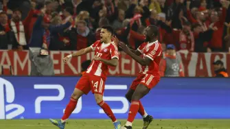 Soccer Football - UEFA Champions League - Quarter Final - Second Leg - Bayern Munich v Real Madrid - Allianz Arena, Munich, Germany - April 15, 2026 Bayern Munich's Luis Diaz celebrates scoring their third goal with Dayot Upamecano REUTERS/Michaela Stache