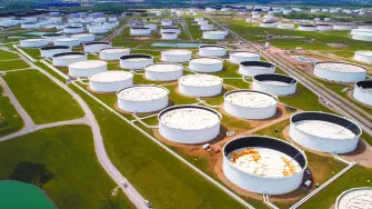 FILE PHOTO: Crude oil storage tanks are seen in an aerial photograph at the Cushing oil hub in Cushing, Oklahoma, U.S. April 21, 2020. REUTERS/Drone Base/File Photo