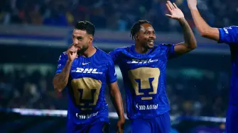 Soccer Football - Liga MX - Quarter Final - Second Leg - Pumas UNAM v America - Estadio Olimpico Universitario, Mexico City, Mexico - May 10, 2026 Pumas UNAM's Nathan Silva celebrates scoring their second goal with Alvaro Angulo REUTERS/Eloisa Sanchez