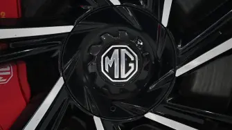 The MG logo is seen on an MG Cyberster at the Beijing Auto Show in Beijing on April 26, 2026. (Photo by GREG BAKER / AFP)