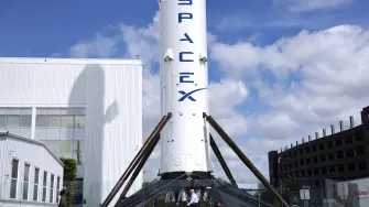 HAWTHORNE, CALIFORNIA - APRIL 02: A SpaceX Falcon 9 rocket is displayed at a SpaceX facility on April 2, 2026 in Hawthorne, California. Elon Musks rocket and satellite company SpaceX has confidentially filed for an initial public offering (IPO) in what may be one of the largest public offerings in history.   Mario Tama/Getty Images/AFP (Photo by MARIO TAMA / GETTY IMAGES NORTH AMERICA / Getty Images via AFP)