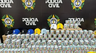 Handout picture released by Rio de Janeiro's Civil Police shows seized counterfeit Panini World Cup album stickers at the Civil Police headquarters, in Rio de Janeiro, Brazil on May 22, 2026. Police in football-mad Brazil seized World Cup contraband including counterfeit jerseys and some 200,000 Panini stickers in Rio de Janeiro, authorities said on May 22, 2026. (Photo by Handout / RIO DE JANEIRO CIVIL POLICE / AFP) / RESTRICTED TO EDITORIAL USE - MANDATORY CREDIT "AFP PHOTO / Rio de Janeiro's Civil Police / HANDOUT /  " - NO MARKETING NO ADVERTISING CAMPAIGNS - DISTRIBUTED AS A SERVICE TO CLIENTS