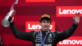 Formula One F1 - Canadian Grand Prix -  Circuit Gilles Villeneuve, Montreal, Quebec, Canada - May 24, 2026 Mercedes' Andrea Kimi Antonelli celebrates on the podium with a trophy after winning the Canadian Grand Prix REUTERS/Mathieu Belanger