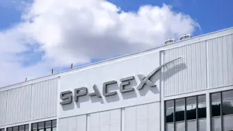 HAWTHORNE, CALIFORNIA - APRIL 02: The SpaceX logo is displayed at a SpaceX facility on April 2, 2026 in Hawthorne, California. Elon Musks rocket and satellite company SpaceX has confidentially filed for an initial public offering (IPO) in what may be one of the largest public offerings in history.   Mario Tama/Getty Images/AFP (Photo by MARIO TAMA / GETTY IMAGES NORTH AMERICA / Getty Images via AFP)