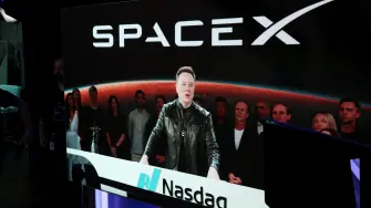 Founder, CEO, Chairman, and Chief Engineer of SpaceX, Elon Musk, speaks via videolink on the day of SpaceX's initial public offering (IPO) at the Nasdaq MarketSite in New York City, U.S., June 12, 2026. REUTERS/Brendan McDermid