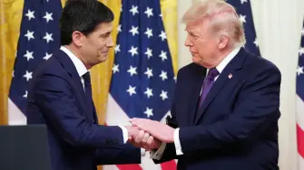 (FILES) US President Donald Trump shakes hands with the new Chairman of the Federal Reserve Kevin Warsh (L) during a swearing in ceremony in the East Room of the White House in Washington, DC on May 22, 2026. US Federal Reserve chief Kevin Warsh will chair his first meeting of the central bank's rate-setting committee next week caught between a rock and a hard place, with inflation at a three-year high and unrelenting pressure from the White House to lower rates. The Fed's 12-member open market committee (FOMC) will begin a two-day meeting on June 16, 2026, and is widely expected to hold rates steady as the effects of US President Donald Trump's war on Iran course through the world's largest economy. (Photo by Aaron Schwartz / AFP)